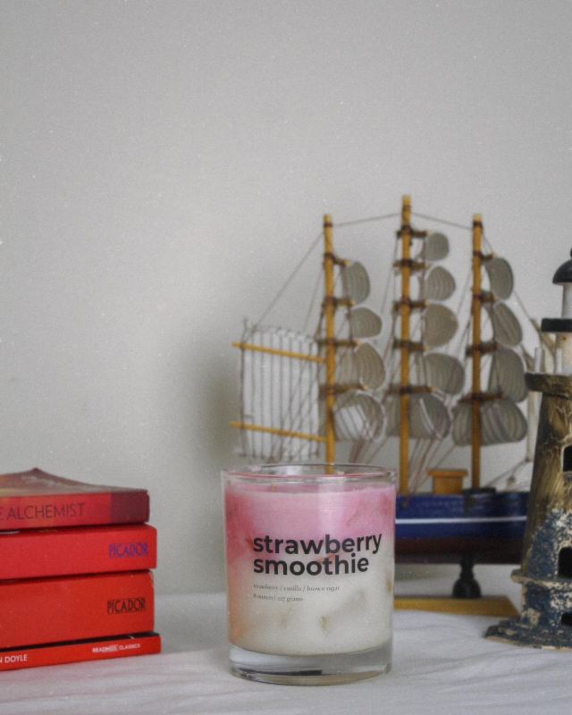 Sweeten your space with the Strawberry Smoothie candle, featuring notes of strawberry, vanilla, and brown sugar. Ideal for a cozy, relaxing atmosphere.